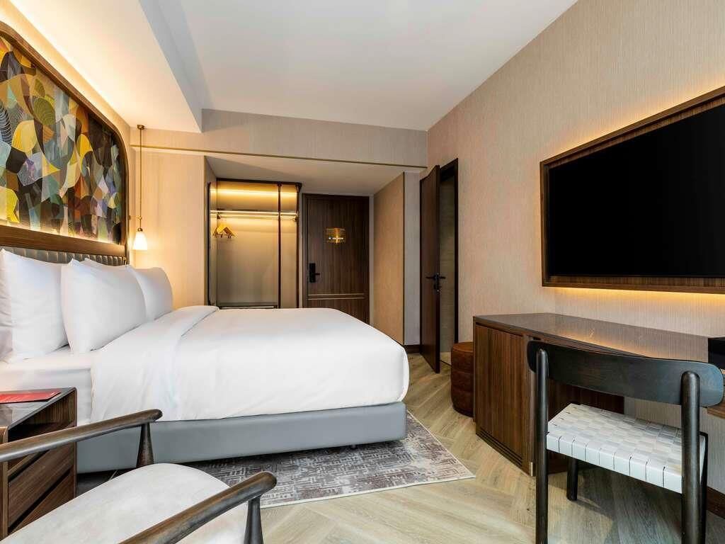 Classic Room, 1 Double Bed, Patio | Free minibar items, in-room safe, blackout drapes, rollaway beds