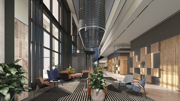 A modern indoor space with large windows, seating areas, and a unique ceiling design. - Novotel Madinah (Madinah)