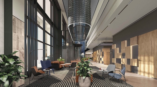 A modern indoor space with large windows, seating areas, and a unique ceiling design.