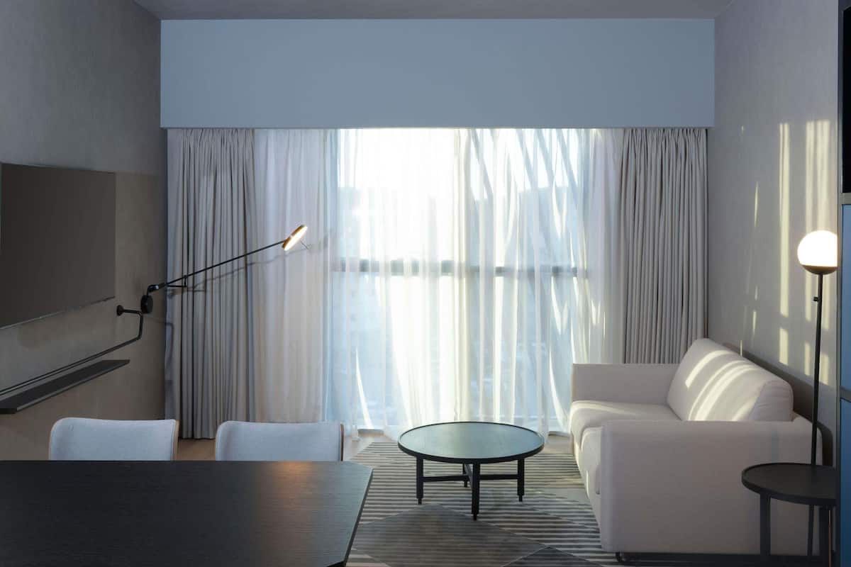 Egyptian cotton sheets, premium bedding, down duvets, in-room safe