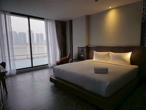 Deluxe Double Room, Pool View | Desk, free WiFi - One Budget Hotel Chiangrai Chiangsaen 2 (Chiang Saen)