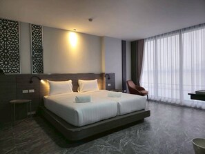 Deluxe Twin Room, Pool View | Desk, free WiFi - One Budget Hotel Chiangrai Chiangsaen 2 (Chiang Saen)