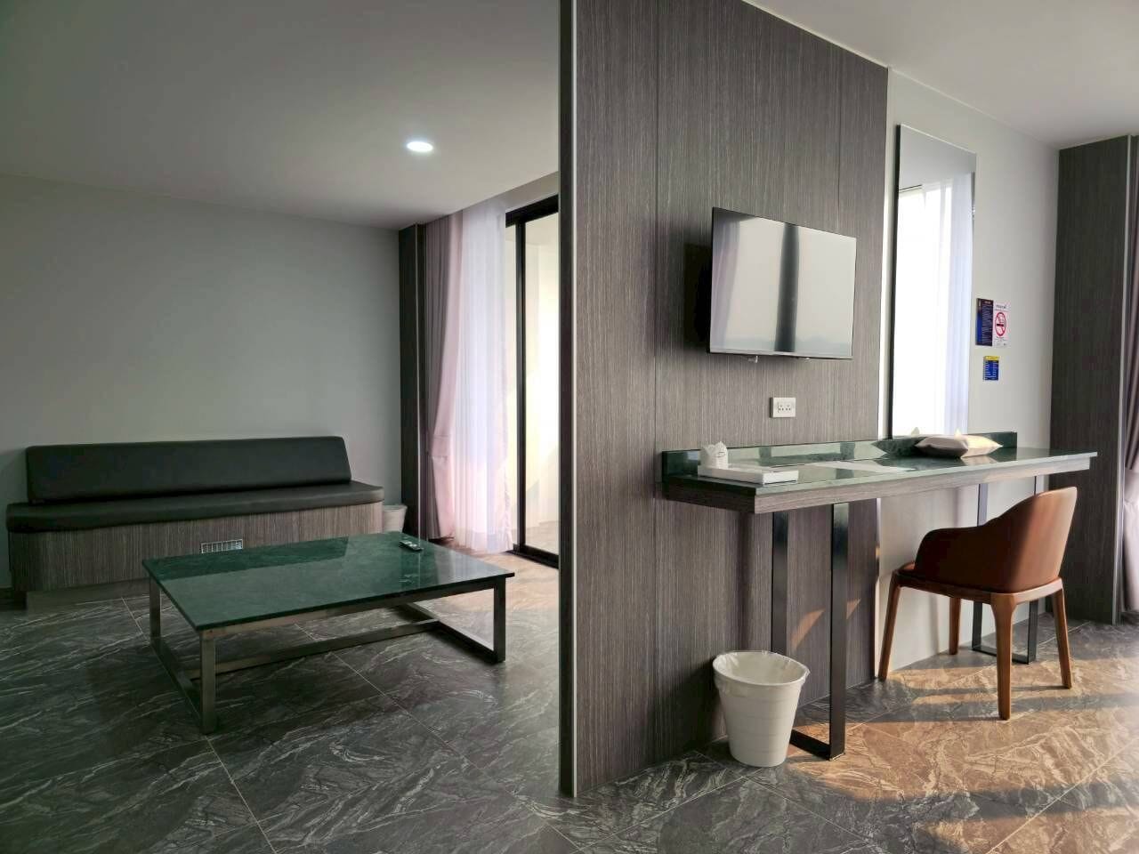 Chambre Deluxe avec lits jumeaux, vue fleuve | Coin séjour