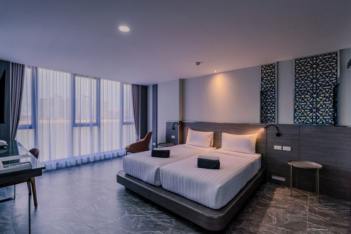 Chambre Deluxe avec lits jumeaux, vue fleuve