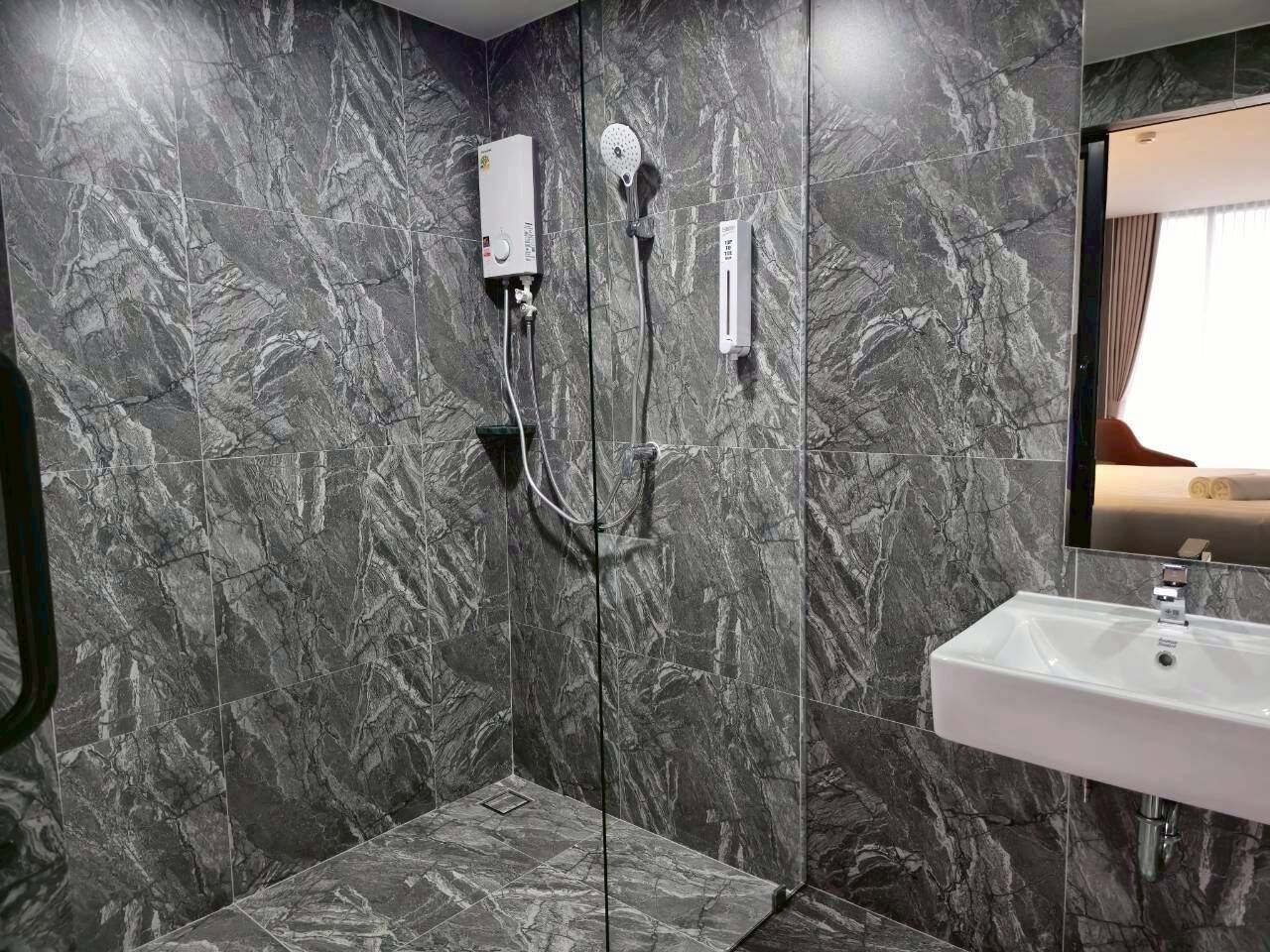 Deluxe Double Room, Pool View | Bathroom | Shower, hair dryer, towels, soap