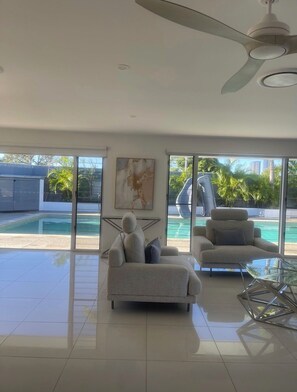 Pool - Waterfront retreat with jetty, pool, waterslide and luxury comfort. (Mermaid Waters)