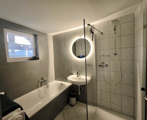 Shower, hair dryer, towels
