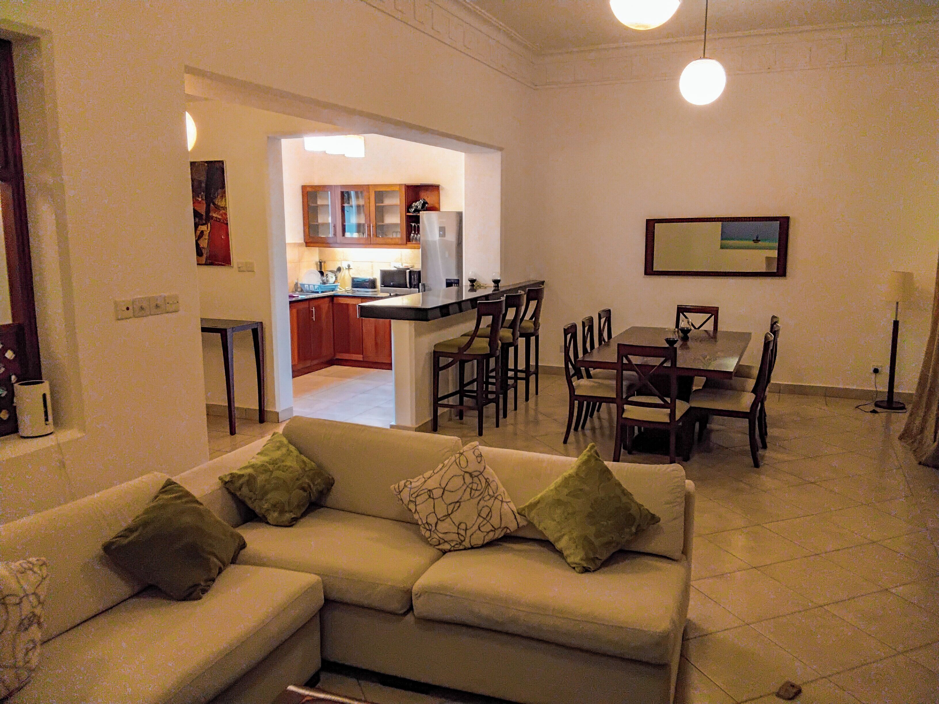Villa Familiale, balcon, vue golf | Coin séjour