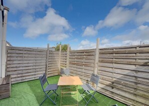 Imagen sin descripción, 3 de 7, botón