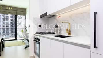 Appartement, balcon, vue ville | Cuisine privée