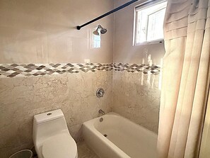 Hair dryer, towels, soap, shampoo