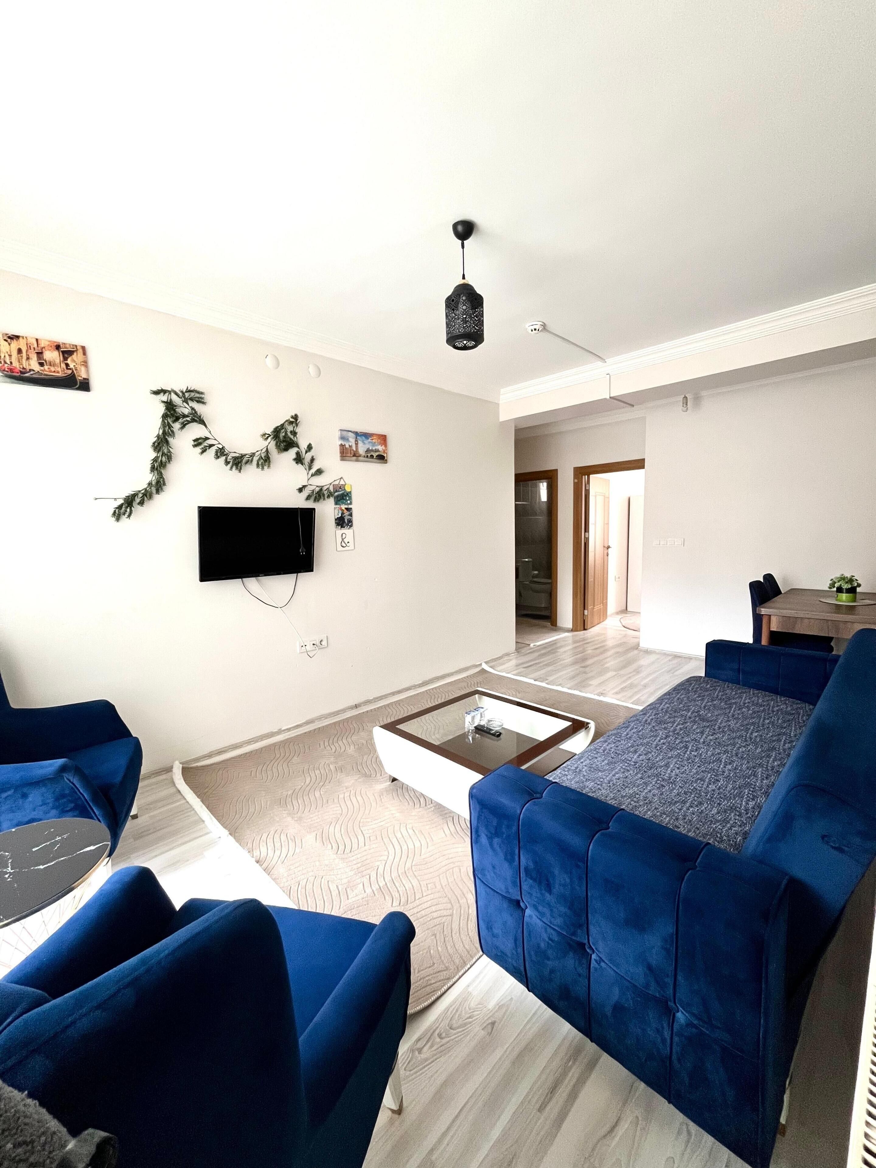 Deluxe Condo, Balcony, City View | Living area