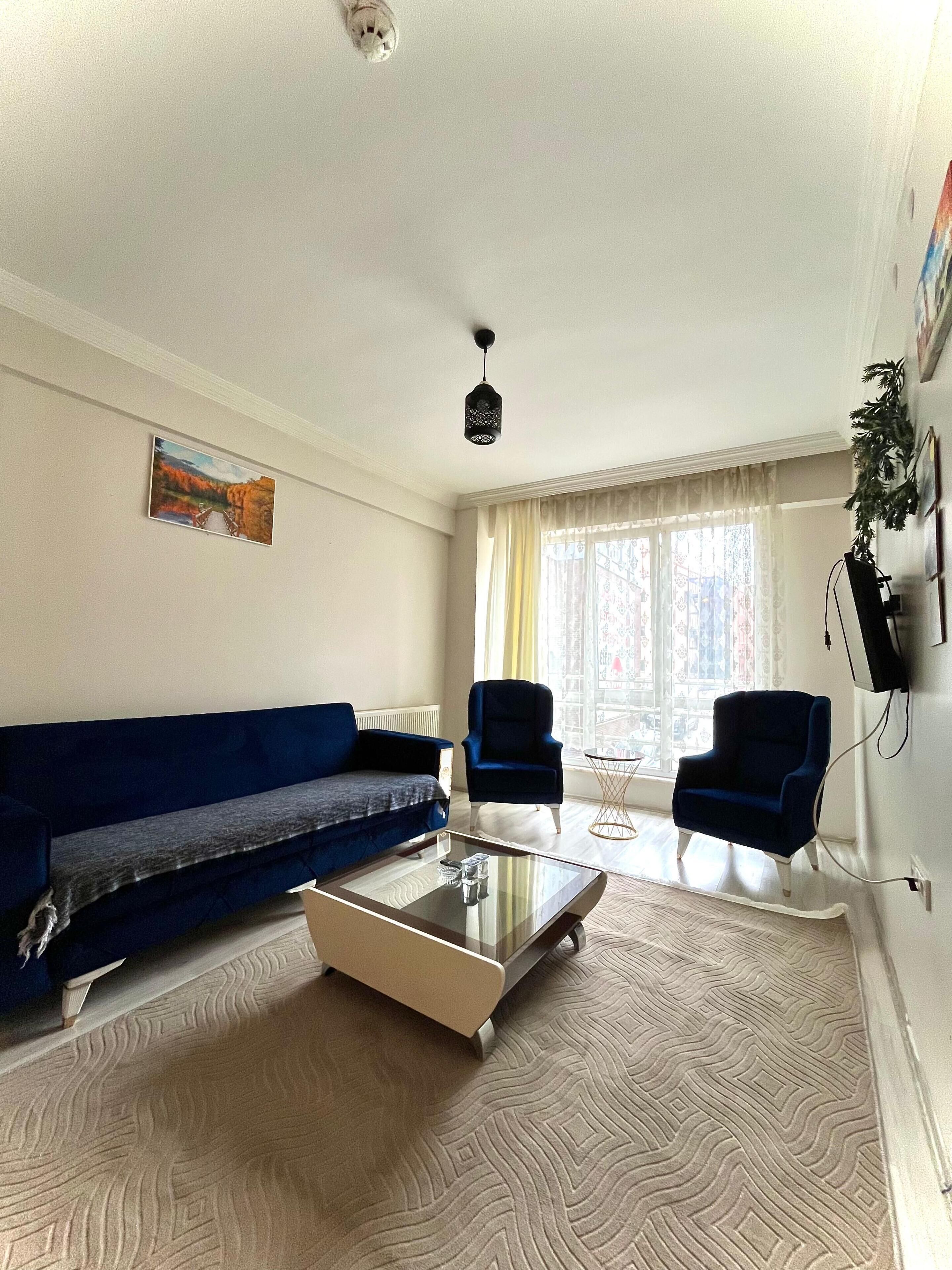 Deluxe Condo, Balcony, City View | Living area