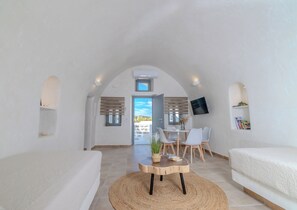 Deluxe Villa, 1 Bedroom, Hot Tub, Sea View | Living area | 34-inch LCD TV with cable channels - Santo Blue Horizon - The Blue Domes View (Santorini)