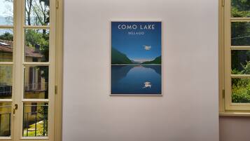 A framed artwork titled "Como Lake Bellagio" on a wall.