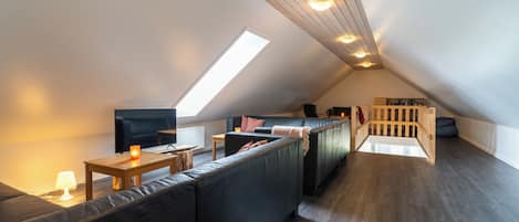 Appartement, plusieurs lits, vue jardin | Coin séjour