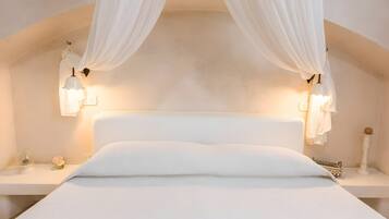 Tabla de planchar con plancha, wifi y ropa de cama