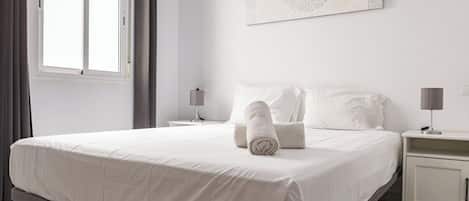 2 habitaciones, tabla de planchar con plancha, wifi y ropa de cama