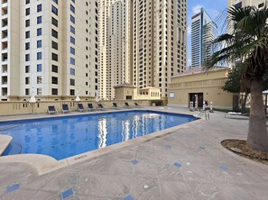 Outdoor pool - Fully Upgraded 2BR Direct Beach Access (Dubai)