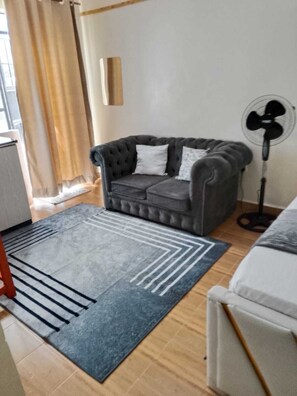 Studio Confort, balcon | Coin séjour