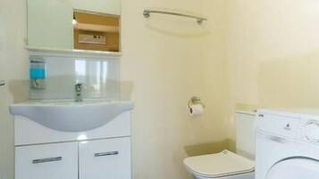 Apartment, Balcony, City View | Bathroom | Free toiletries, hair dryer, slippers, towels