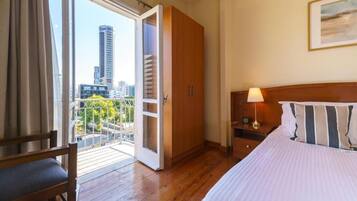 Apartment, Balcony, City View | Desk, iron/ironing board, free WiFi