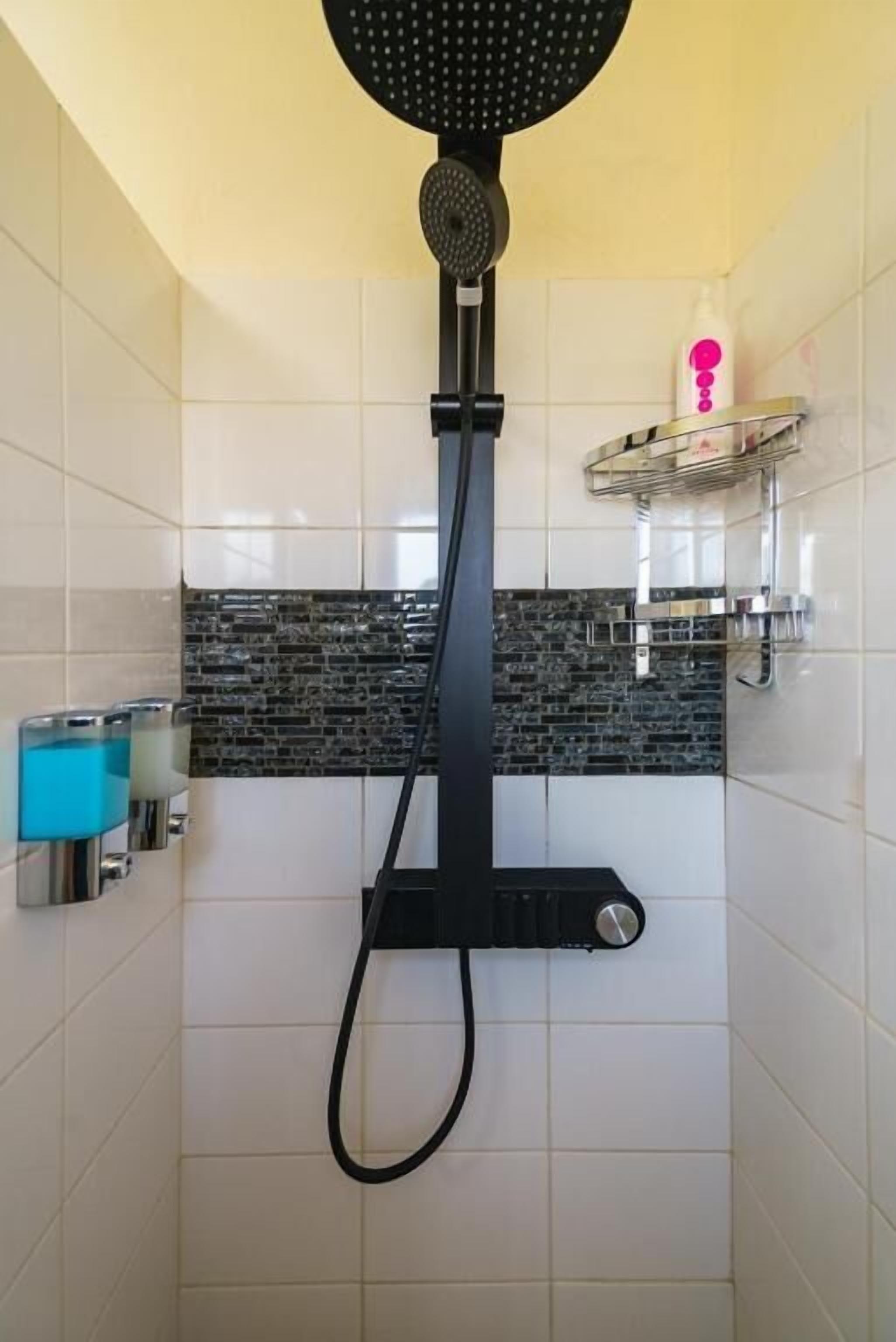 Apartment, Balcony, City View | Bathroom | Free toiletries, hair dryer, slippers, towels