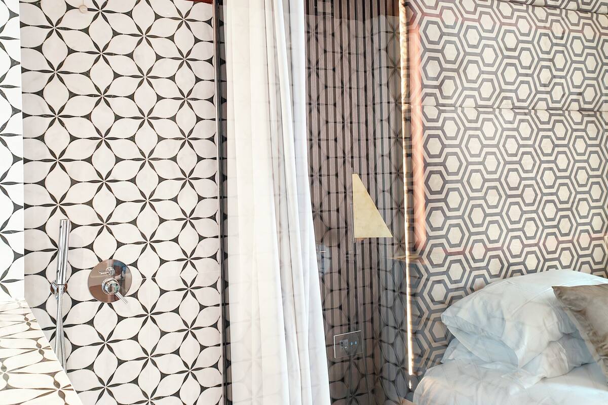 Junior Suite, Balcony, Sea View | Bathroom | Hair dryer, slippers, towels, soap