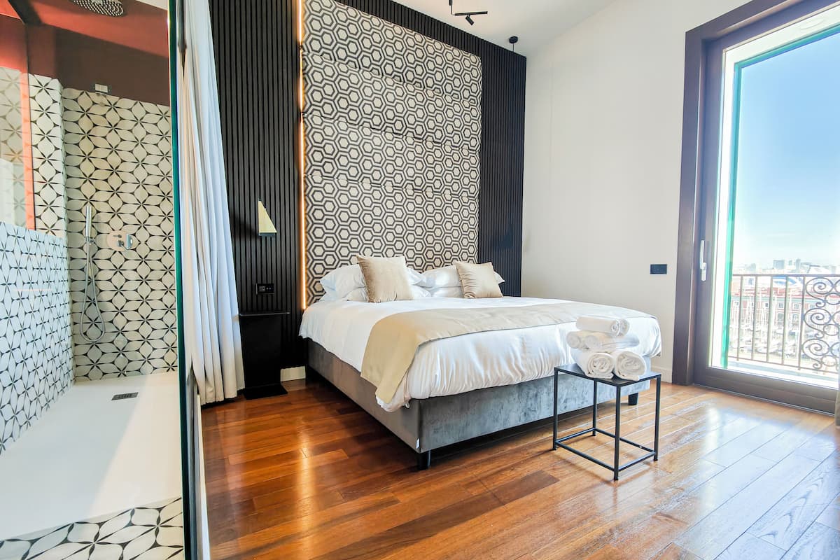 Junior Suite, Balcony, Sea View | Desk, laptop workspace, blackout drapes, soundproofing