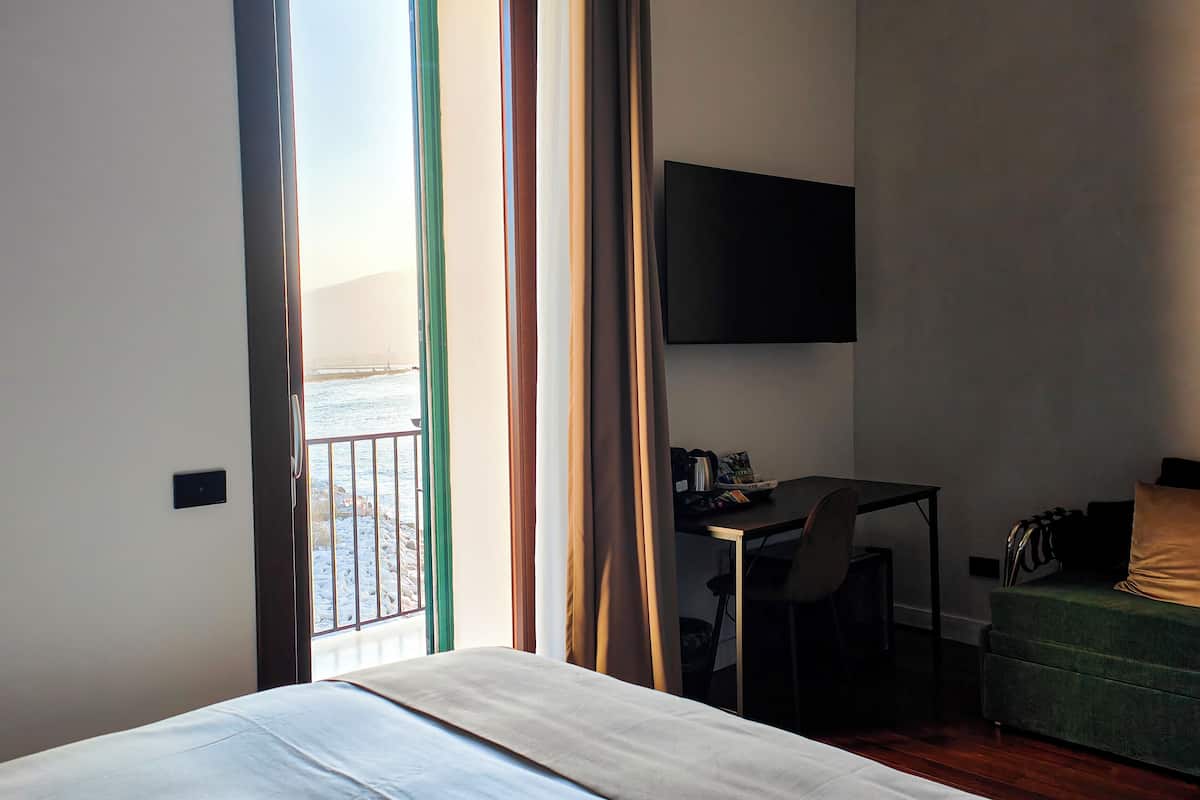 Desk, laptop workspace, blackout drapes, soundproofing