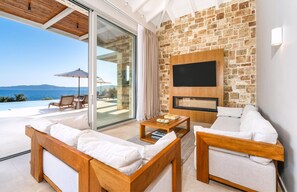 TV - Elegant Waterfront Villa with Uninterrupted Ionian Views and Direct Sea Access (Meganissi)