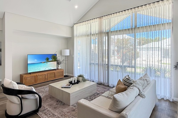 This living area with a bright and welcoming living space designed for comfort, relaxation, and quality time together.