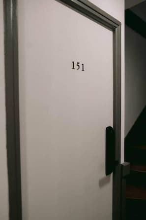 A door with the number 151 on it. - Georges’ Garden – 151 (Périgueux)