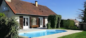 Chambre d’hôtes « Chez Pierre et Jocelyne » avec piscine partagée, Wi-Fi et climatisation