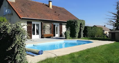 Guest Room "Chez Pierre et Jocelyne" with Shared Pool, Wi-Fi, and Air Conditioning