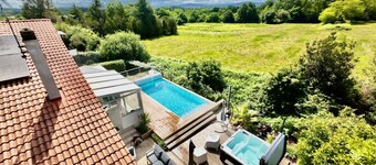 Spacious 6-bedroom villa in Boucau with heated pool, private spa & outside bar.
