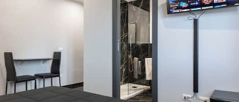 Deluxe Triple Room, 1 King Bed with Sofa bed, Private Bathroom | In-room safe, desk, laptop workspace, blackout drapes