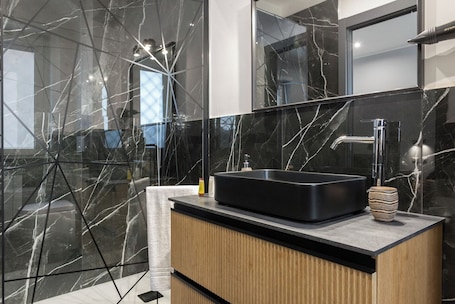 Deluxe Triple Room, 1 King Bed with Sofa bed, Private Bathroom | Bathroom | Shower, free toiletries, hair dryer, bidet. Magami Station Ciampino