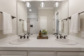 Shower, jetted tub, hair dryer, towels