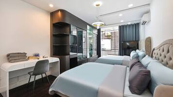 Family Room, River View | Minibar, desk, free WiFi, bed sheets