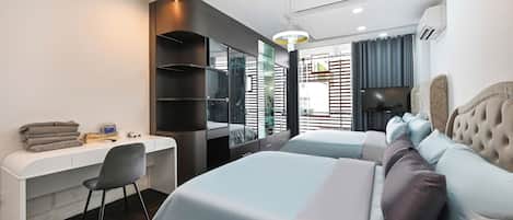 Quarto família, vista para o rio | Frigobar, escrivaninha, Wi-Fi de cortesia, roupa de cama