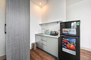 Family Room, River View | Private kitchen | Fridge, cookware/dishes/utensils - M Home Riverside (Ho Chi Minh City)