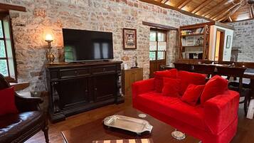 TV, fireplace, books, offices