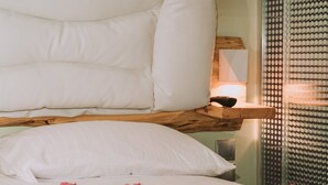 A bed with white bedding and a wooden headboard. - Gazi Suite With Private Rooftop (Athina)
