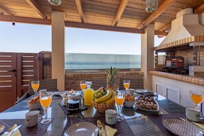 Outdoor dining - Thalassa Beachfront Villa with private pool (Prinos)