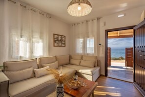 TV - Thalassa Beachfront Villa with private pool (Prinos)