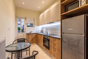 Fridge, oven, coffee/tea maker, cookware/dishes/utensils - Prime 2BR Apartment next to Kallimarmaro Stadium (Athens)
