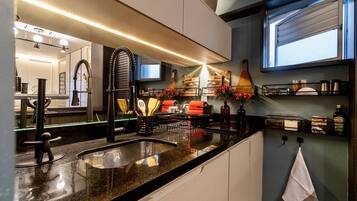 Departamento | Cocina privada | Refrigerador, microondas, horno y lavavajillas