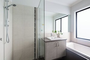 Shower, towels, toilet paper