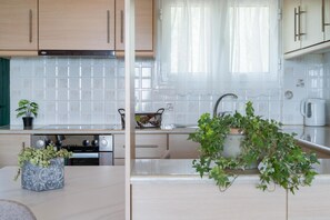 Fridge, microwave, oven, stovetop - 204 - 2 Bedroom Apartment with Sea View (Moussata)